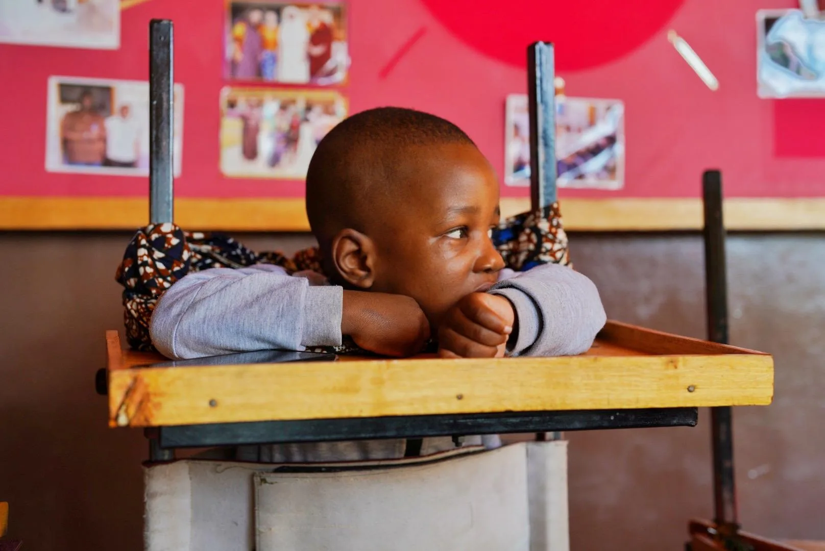 A child upright in a standing frame at the Centre